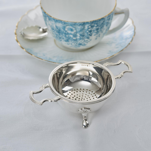 Silver tea strainer & stand