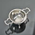 Silver tea strainer & stand