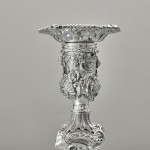 Pair of impressive antique cast silver candlesticks by royal silversmith