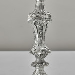 Pair of impressive antique cast silver candlesticks by royal silversmith