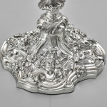 Pair of impressive antique cast silver candlesticks by royal silversmith