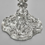 Pair of impressive antique cast silver candlesticks by royal silversmith