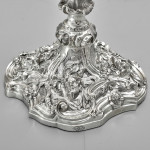 Pair of impressive antique cast silver candlesticks by royal silversmith