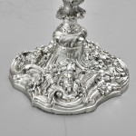 Pair of impressive antique cast silver candlesticks by royal silversmith