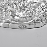 Pair of impressive antique cast silver candlesticks by royal silversmith