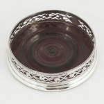 Pair of George III silver wine bottle coasters