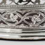 Pair of George III silver wine bottle coasters