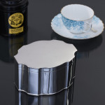 Large scalloped silver tea caddy