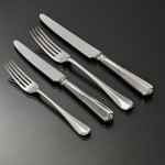 Set of antique Edwardian hand-forged 4-prong Rattail pattern silver cutlery for 24