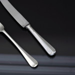 Set of 20th-century antique hand-forged 4-prong Rattail sterling silver cutlery for 12
