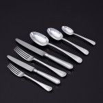 Set of hand-forged one-date-and-maker antique Featheredge pattern stering silver cutlery for 12