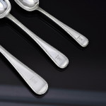 Set of hand-forged one-date-and-maker antique Featheredge pattern stering silver cutlery for 12