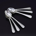 Set of hand-forged one-date-and-maker antique Featheredge pattern stering silver cutlery for 12