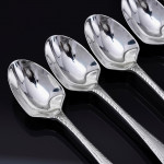 Set of hand-forged one-date-and-maker antique Featheredge pattern stering silver cutlery for 12