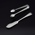 Set of hand-forged one-date-and-maker antique Featheredge pattern stering silver cutlery for 12