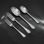 Set of hand-forged Victorian Rattail pattern sterling silver cutlery for 12