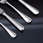 Set of antique hand-forged Rattail pattern sterling silver cutlery for 12