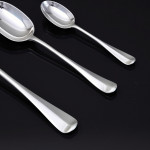 Set of antique hand-forged Rattail pattern sterling silver cutlery for 12