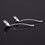 Set of antique hand-forged Rattail pattern sterling silver cutlery for 12