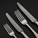 Set of George III hand-forged Old English sterling silver cutlery for 12