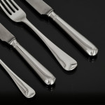 Set of George III hand-forged Old English sterling silver cutlery for 12