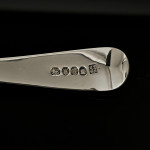 Set of George III hand-forged Old English sterling silver cutlery for 12