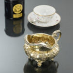 Large George IV sterling silver-gilt milk jug