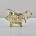 Large George IV sterling silver-gilt milk jug