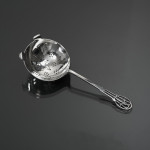 Art Deco style sterling silver tea strainer