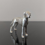 Cast sterling silver model of a boxer dog