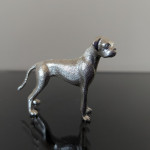 Cast sterling silver model of a boxer dog