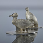 Set of four antique duck & grouse sterling silver menu holders