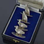 Set of four antique duck & grouse sterling silver menu holders