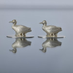 Set of four antique duck & grouse sterling silver menu holders