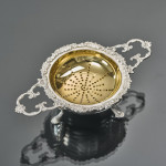 Two-handled sterling silver tea strainer & drip bowl