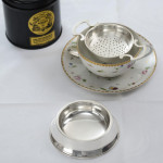 Two-handled sterling silver tea strainer & drip bowl