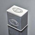 Edwardian sterling silver tea caddy with shell decoration