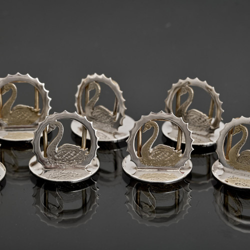 Matched set of 12 sterling silver swan place card holders