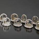 Matched set of 12 sterling silver swan place card holders