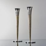 Pair of rare mid-century sterling silver-gilt candlesticks