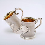 Pair of antique sterling silver half-pint mugs