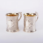 Pair of antique sterling silver half-pint mugs