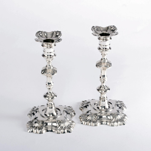 Pair of George II cast sterling silver candlesticks