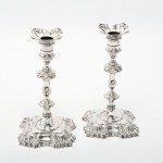 Pair of George II cast sterling silver candlesticks