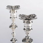 Pair of George II cast sterling silver candlesticks