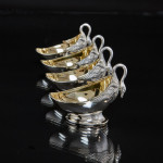 Set of four antique sterling silver swan dishes