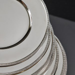 Set of 12 mid-century sterling silver underplates
