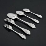 Rare set of Victorian hand-forged New Gothic sterling silver cutlery for 18