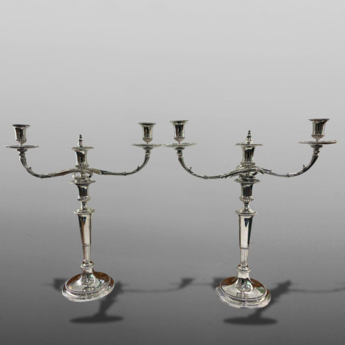 Pair of George III sterling silver three-light candelabra