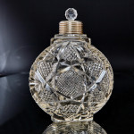 Pair of large Victorian cut glass & sterling-silver-mounted perfume bottles